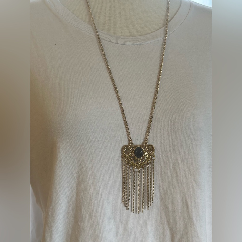 Egyptian Style Pendant on Gold Style Chain/ necklace.